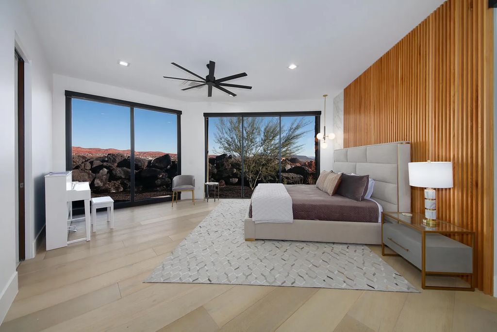 2399 N Kiva Trail, Saint George, Utah is a truly one of a kind contemporary estate sits 28 feet above the street below, boasts 360 degree views, including a picture perfect framing of Snow Canyon, Red Mountain, Pine Valley Mountain, Movie Rock, and the Kachina Cliffs.