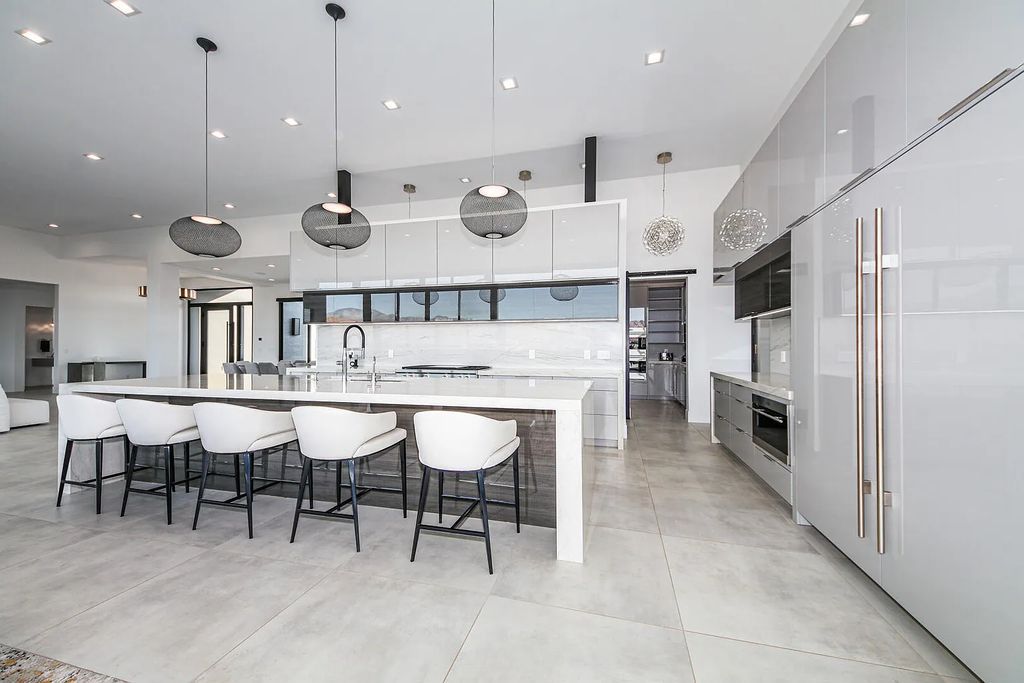 2399 N Kiva Trail, Saint George, Utah is a truly one of a kind contemporary estate sits 28 feet above the street below, boasts 360 degree views, including a picture perfect framing of Snow Canyon, Red Mountain, Pine Valley Mountain, Movie Rock, and the Kachina Cliffs.