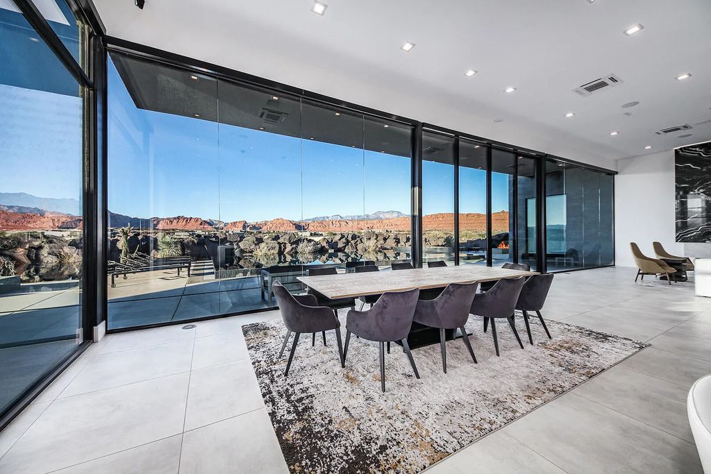 2399 N Kiva Trail, Saint George, Utah is a truly one of a kind contemporary estate sits 28 feet above the street below, boasts 360 degree views, including a picture perfect framing of Snow Canyon, Red Mountain, Pine Valley Mountain, Movie Rock, and the Kachina Cliffs.
