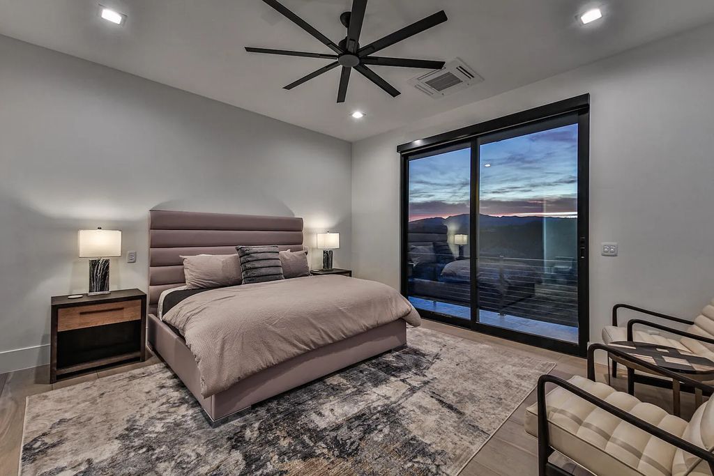 2399 N Kiva Trail, Saint George, Utah is a truly one of a kind contemporary estate sits 28 feet above the street below, boasts 360 degree views, including a picture perfect framing of Snow Canyon, Red Mountain, Pine Valley Mountain, Movie Rock, and the Kachina Cliffs.