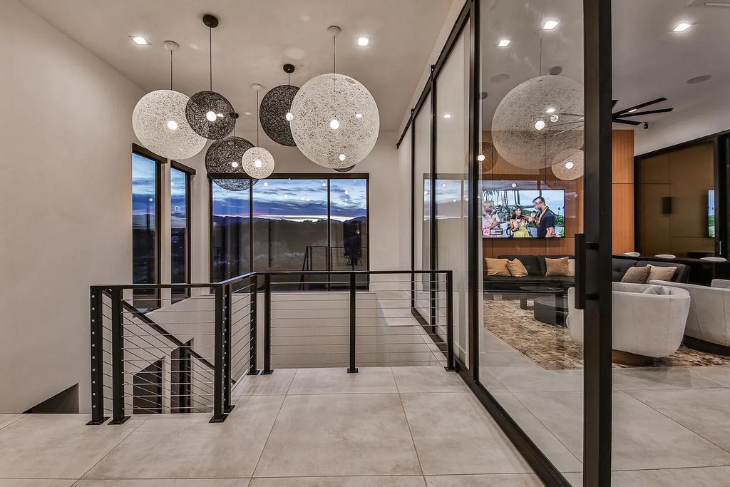 2399 N Kiva Trail, Saint George, Utah is a truly one of a kind contemporary estate sits 28 feet above the street below, boasts 360 degree views, including a picture perfect framing of Snow Canyon, Red Mountain, Pine Valley Mountain, Movie Rock, and the Kachina Cliffs.