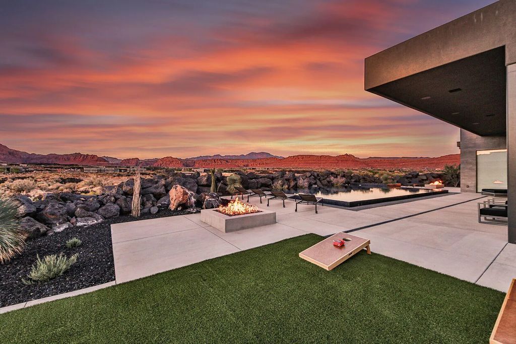 2399 N Kiva Trail, Saint George, Utah is a truly one of a kind contemporary estate sits 28 feet above the street below, boasts 360 degree views, including a picture perfect framing of Snow Canyon, Red Mountain, Pine Valley Mountain, Movie Rock, and the Kachina Cliffs.