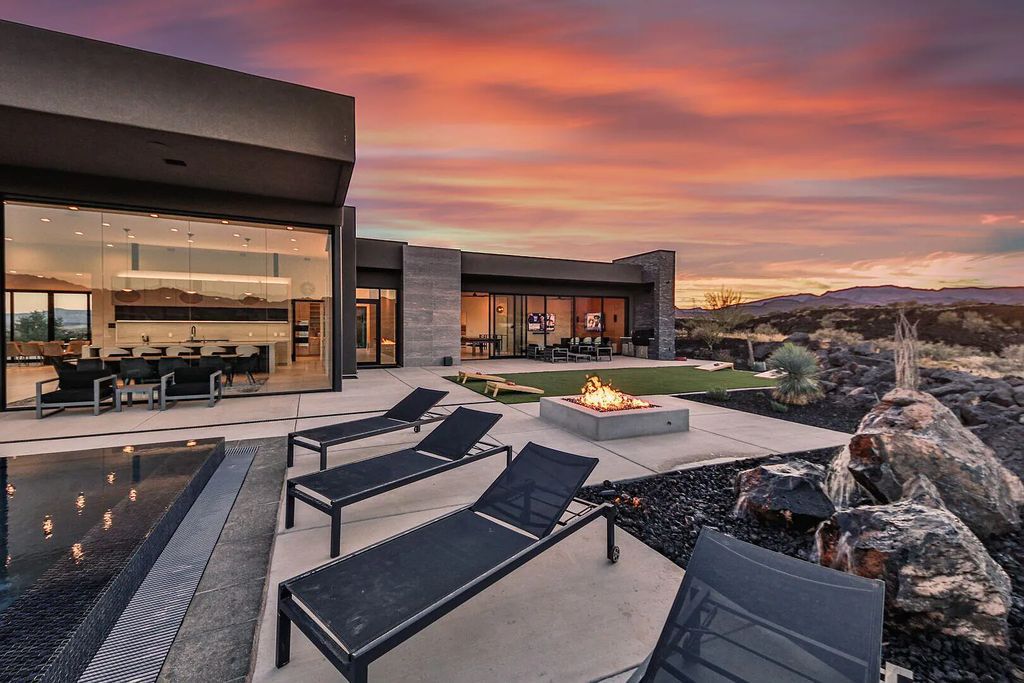 2399 N Kiva Trail, Saint George, Utah is a truly one of a kind contemporary estate sits 28 feet above the street below, boasts 360 degree views, including a picture perfect framing of Snow Canyon, Red Mountain, Pine Valley Mountain, Movie Rock, and the Kachina Cliffs.