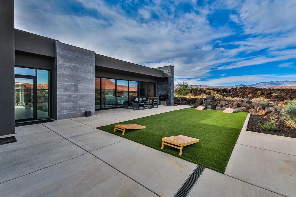 2399 N Kiva Trail, Saint George, Utah is a truly one of a kind contemporary estate sits 28 feet above the street below, boasts 360 degree views, including a picture perfect framing of Snow Canyon, Red Mountain, Pine Valley Mountain, Movie Rock, and the Kachina Cliffs.