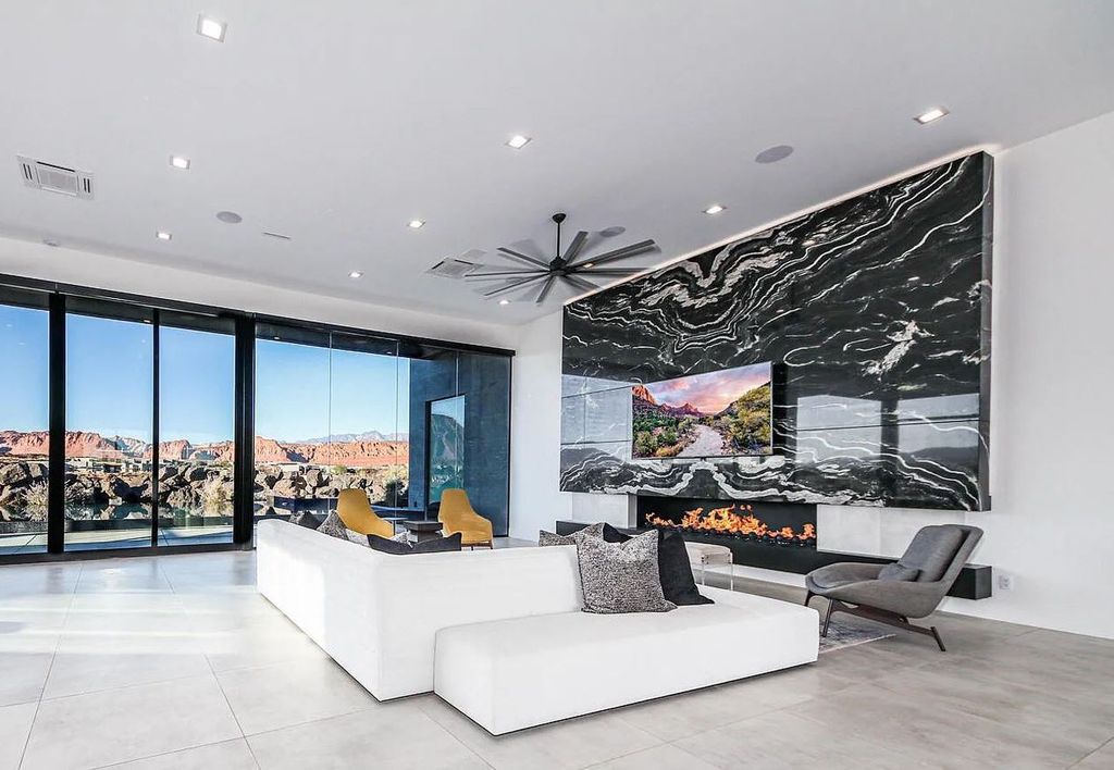 2399 N Kiva Trail, Saint George, Utah is a truly one of a kind contemporary estate sits 28 feet above the street below, boasts 360 degree views, including a picture perfect framing of Snow Canyon, Red Mountain, Pine Valley Mountain, Movie Rock, and the Kachina Cliffs.