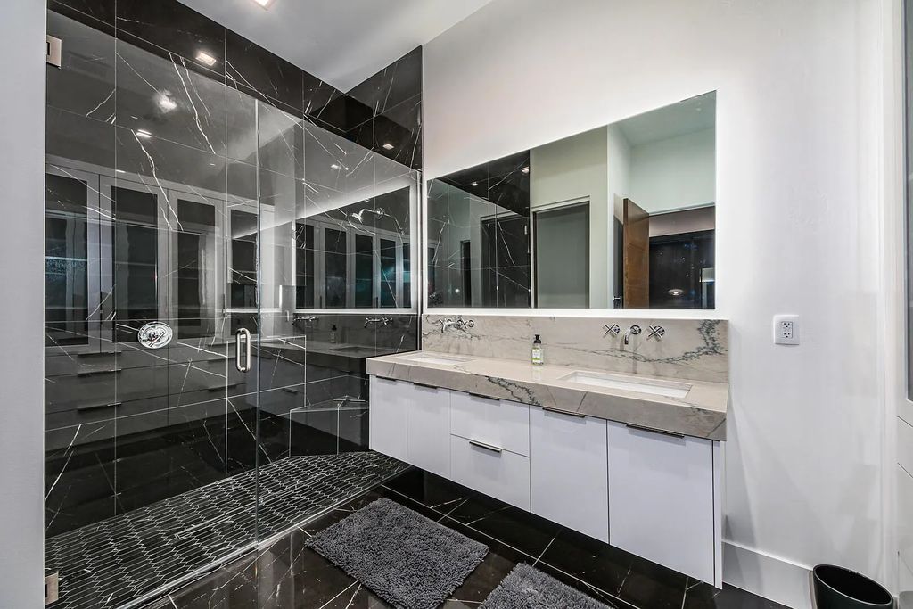 2399 N Kiva Trail, Saint George, Utah is a truly one of a kind contemporary estate sits 28 feet above the street below, boasts 360 degree views, including a picture perfect framing of Snow Canyon, Red Mountain, Pine Valley Mountain, Movie Rock, and the Kachina Cliffs.