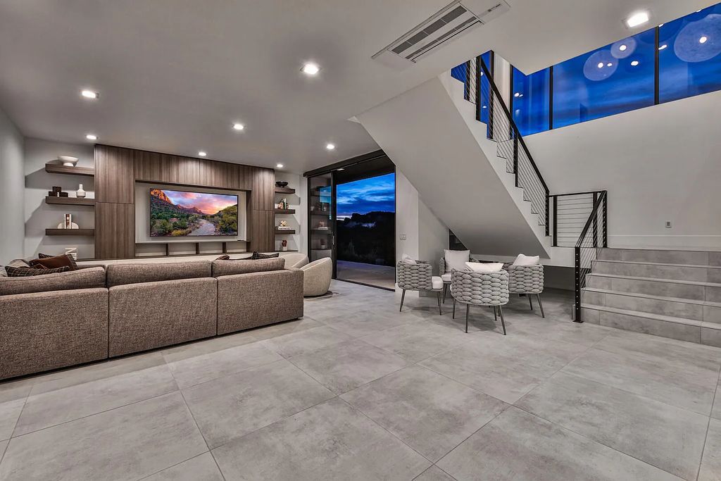 2399 N Kiva Trail, Saint George, Utah is a truly one of a kind contemporary estate sits 28 feet above the street below, boasts 360 degree views, including a picture perfect framing of Snow Canyon, Red Mountain, Pine Valley Mountain, Movie Rock, and the Kachina Cliffs.