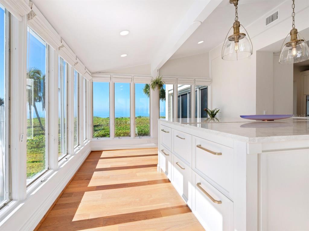 8218 Sanderling Rd, Sarasota, Florida is a private resort-like compound with over 300 feet of direct beachfront rests on over 4-acres between the tranquil blue Gulf of Mexico waters and the quiet banks of Heron Lagoon in the Sanderling Club.