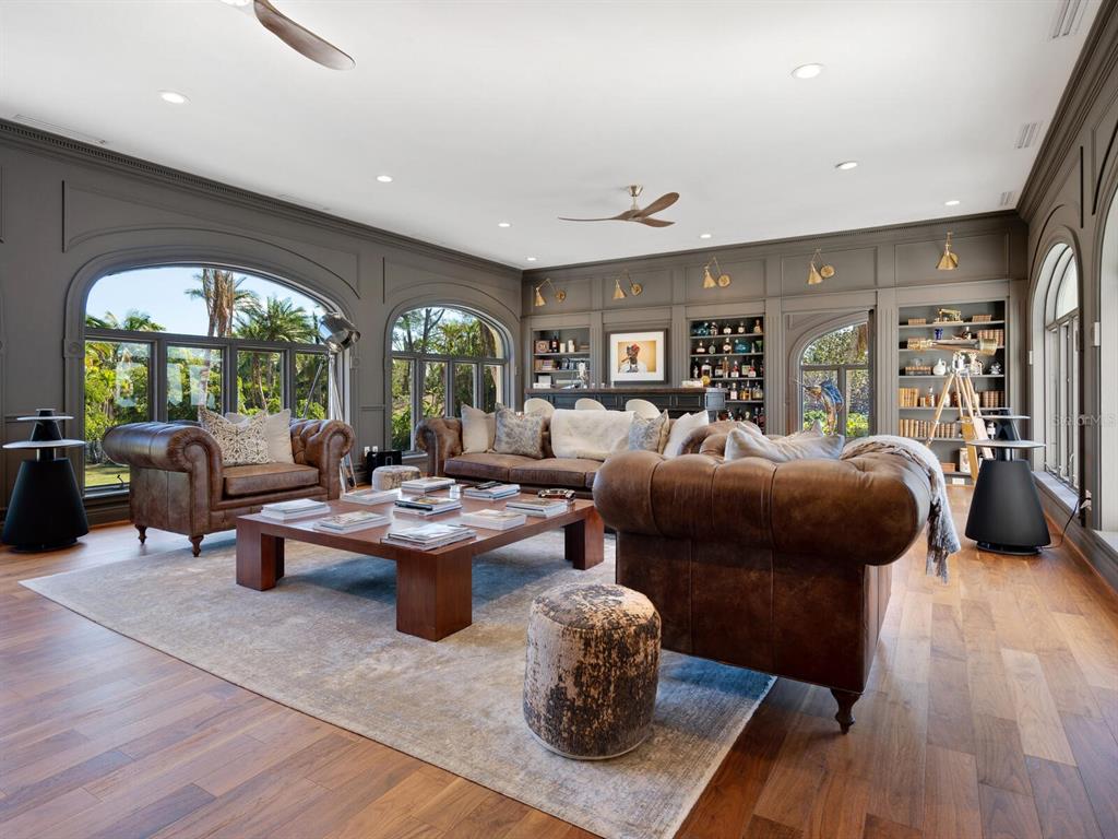 8218 Sanderling Rd, Sarasota, Florida is a private resort-like compound with over 300 feet of direct beachfront rests on over 4-acres between the tranquil blue Gulf of Mexico waters and the quiet banks of Heron Lagoon in the Sanderling Club.