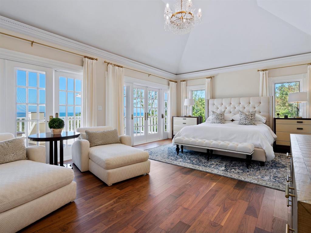 8218 Sanderling Rd, Sarasota, Florida is a private resort-like compound with over 300 feet of direct beachfront rests on over 4-acres between the tranquil blue Gulf of Mexico waters and the quiet banks of Heron Lagoon in the Sanderling Club.