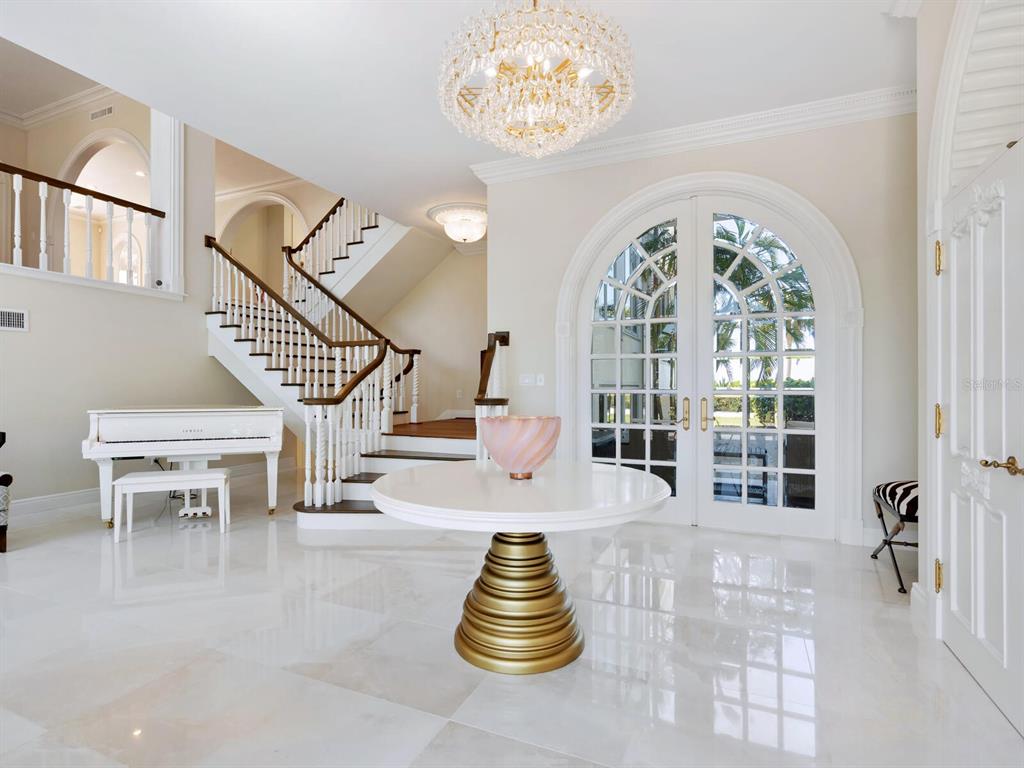 8218 Sanderling Rd, Sarasota, Florida is a private resort-like compound with over 300 feet of direct beachfront rests on over 4-acres between the tranquil blue Gulf of Mexico waters and the quiet banks of Heron Lagoon in the Sanderling Club.