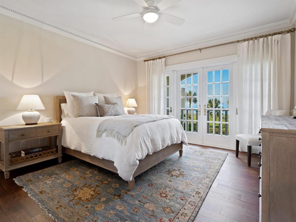 8218 Sanderling Rd, Sarasota, Florida is a private resort-like compound with over 300 feet of direct beachfront rests on over 4-acres between the tranquil blue Gulf of Mexico waters and the quiet banks of Heron Lagoon in the Sanderling Club.