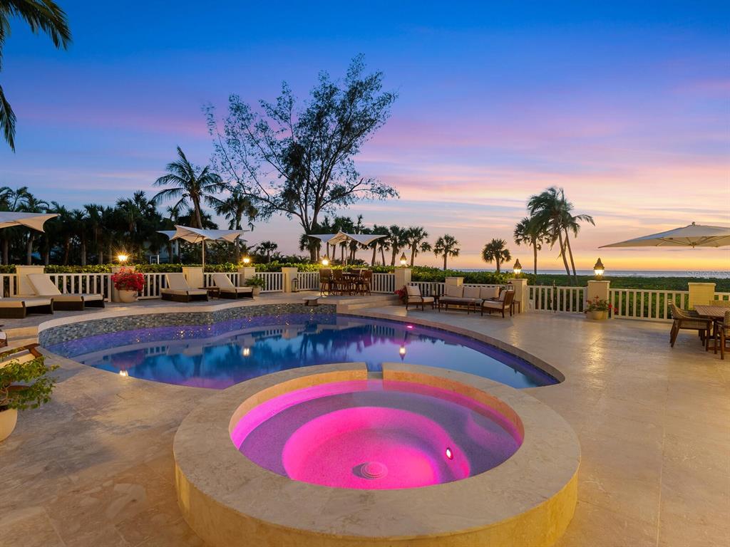 8218 Sanderling Rd, Sarasota, Florida is a private resort-like compound with over 300 feet of direct beachfront rests on over 4-acres between the tranquil blue Gulf of Mexico waters and the quiet banks of Heron Lagoon in the Sanderling Club.