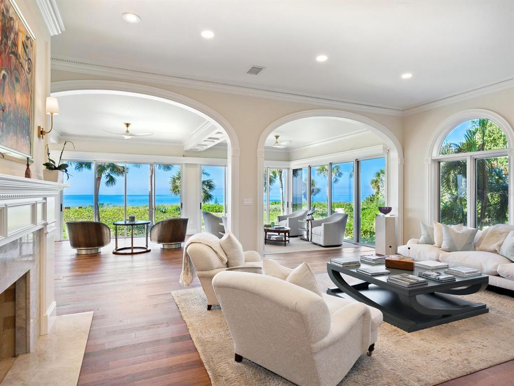 8218 Sanderling Rd, Sarasota, Florida is a private resort-like compound with over 300 feet of direct beachfront rests on over 4-acres between the tranquil blue Gulf of Mexico waters and the quiet banks of Heron Lagoon in the Sanderling Club.