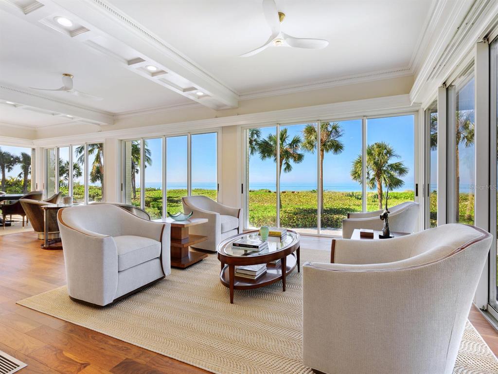 8218 Sanderling Rd, Sarasota, Florida is a private resort-like compound with over 300 feet of direct beachfront rests on over 4-acres between the tranquil blue Gulf of Mexico waters and the quiet banks of Heron Lagoon in the Sanderling Club.