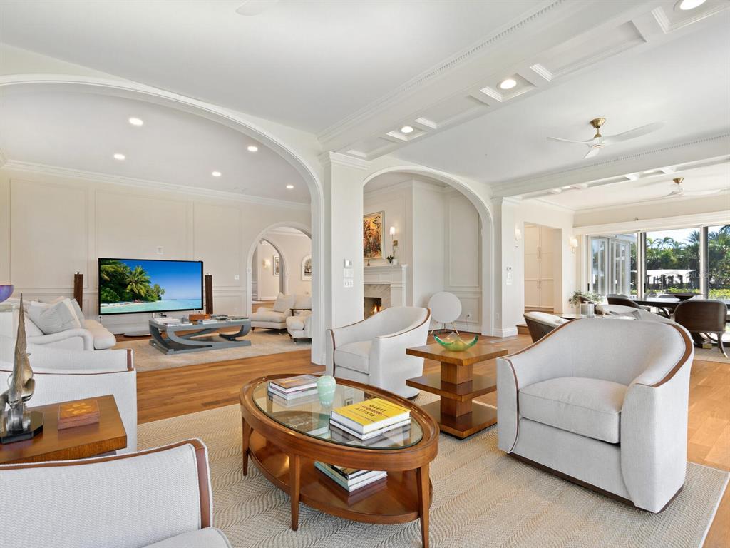 8218 Sanderling Rd, Sarasota, Florida is a private resort-like compound with over 300 feet of direct beachfront rests on over 4-acres between the tranquil blue Gulf of Mexico waters and the quiet banks of Heron Lagoon in the Sanderling Club.