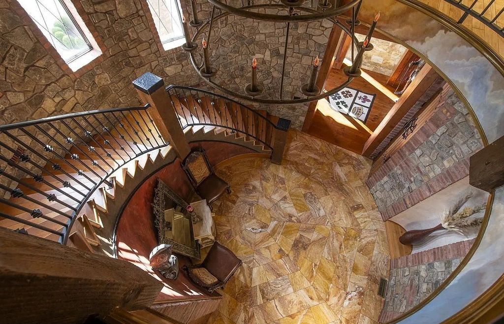 The Estate in Portland is a luxurious home fully furnished with vineyard and underground wine cellar now available for sale. This home located at 14125 NW Germantown Rd, Portland, Oregon; offering 06 bedrooms and 06 bathrooms with 13,000 square feet of living spaces.