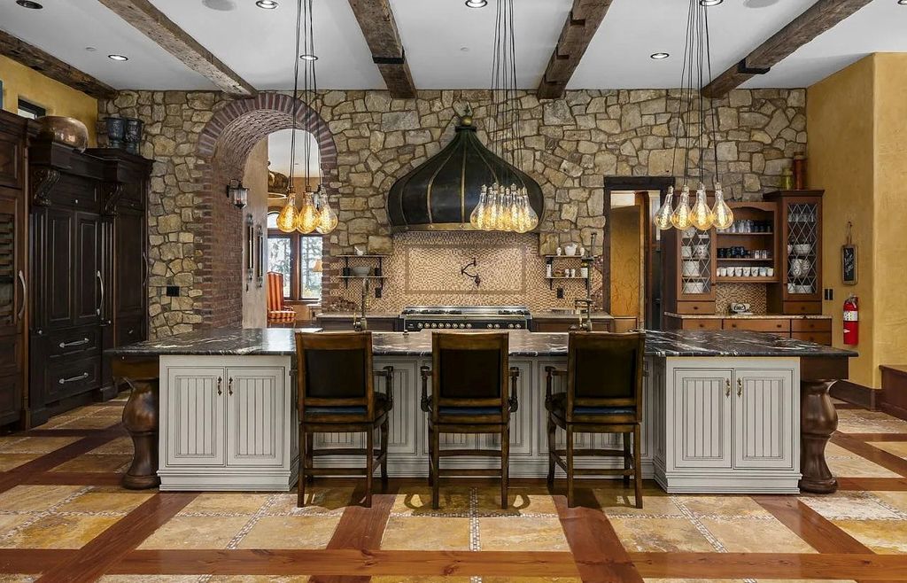 The Estate in Portland is a luxurious home fully furnished with vineyard and underground wine cellar now available for sale. This home located at 14125 NW Germantown Rd, Portland, Oregon; offering 06 bedrooms and 06 bathrooms with 13,000 square feet of living spaces.