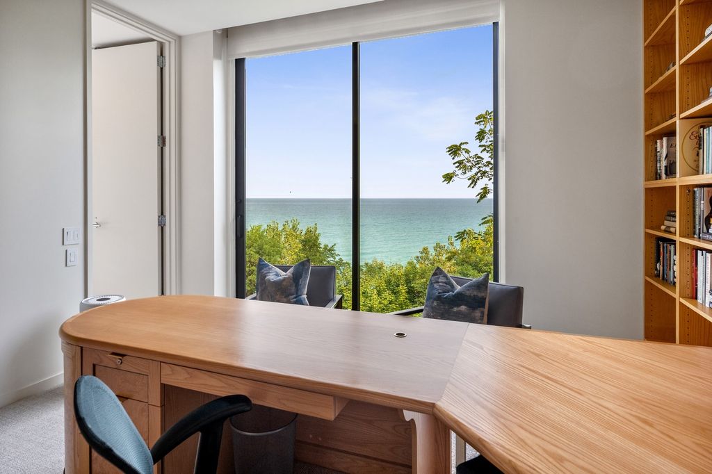 The Home in Glencoe is a luxurious home with great vistas of the lake make for a relax living experience, now available for sale. This home located at 325 Shoreline Ct, Glencoe, Illinois