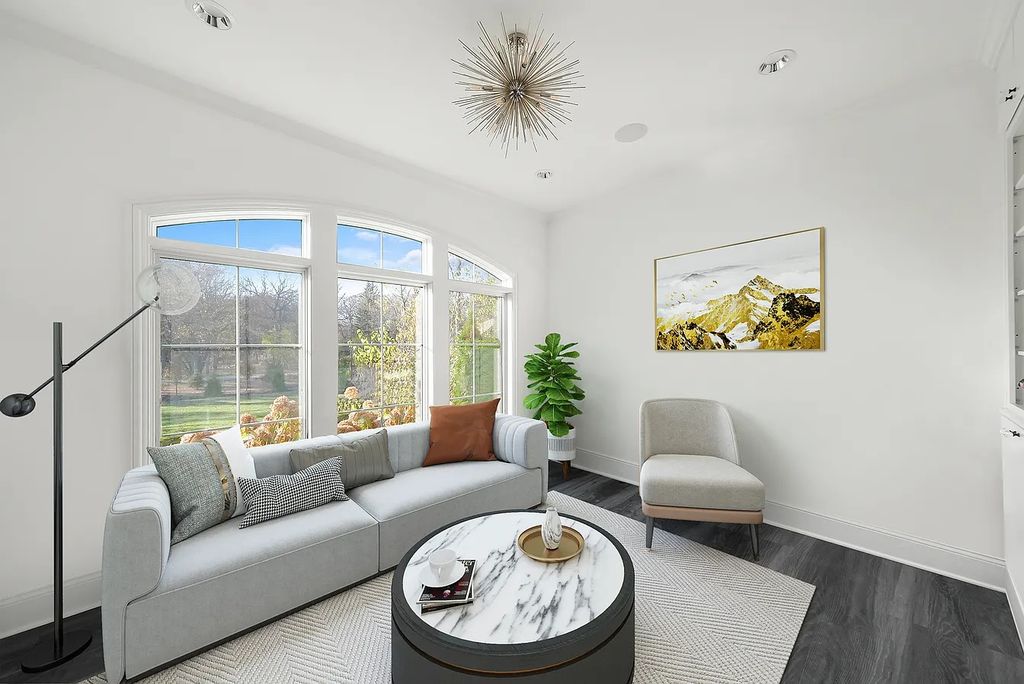 The Estate in Lincolnshire offers a grand scale foyer, ebony oak floors, an open floor plan, soaring ceiling heights, custom luxury finishes throughout now available for sale. This home located at 23477 N Elm Rd, Lincolnshire, Illinois