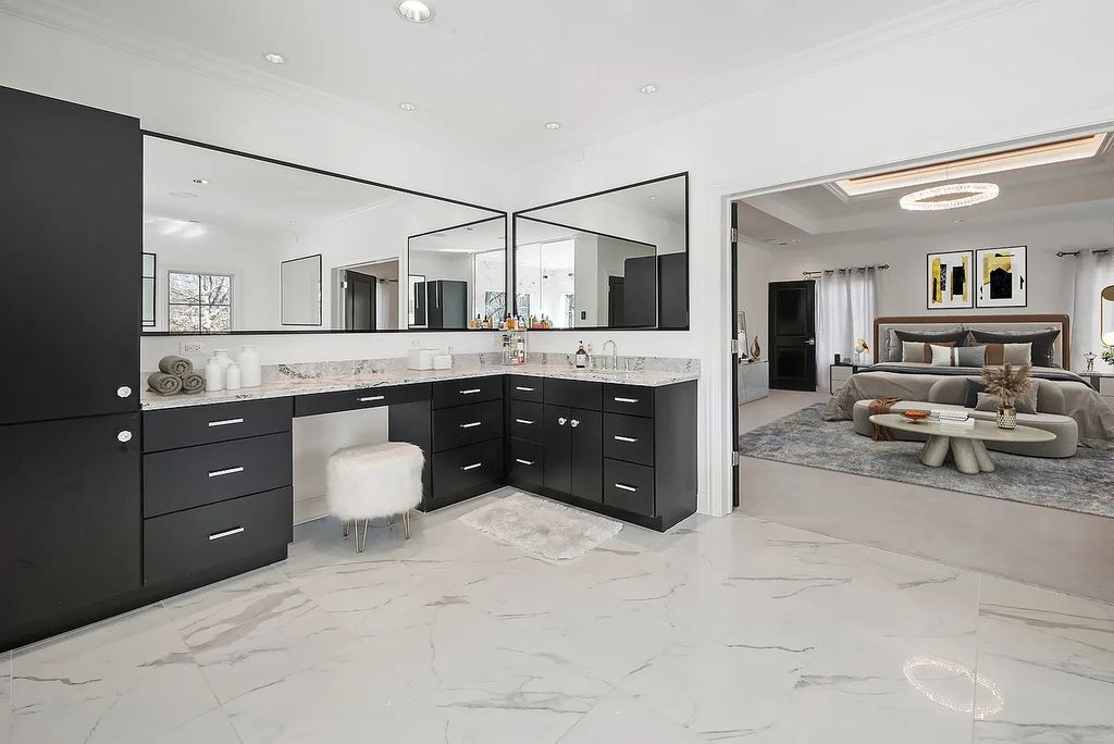 The Estate in Lincolnshire offers a grand scale foyer, ebony oak floors, an open floor plan, soaring ceiling heights, custom luxury finishes throughout now available for sale. This home located at 23477 N Elm Rd, Lincolnshire, Illinois