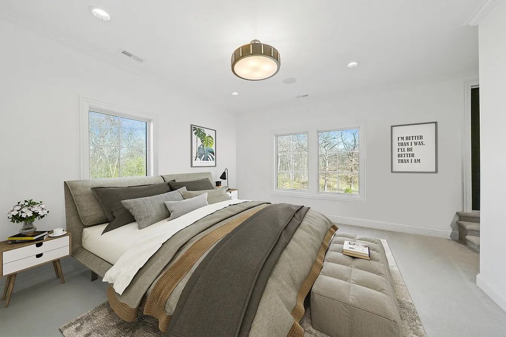 The Estate in Lincolnshire offers a grand scale foyer, ebony oak floors, an open floor plan, soaring ceiling heights, custom luxury finishes throughout now available for sale. This home located at 23477 N Elm Rd, Lincolnshire, Illinois