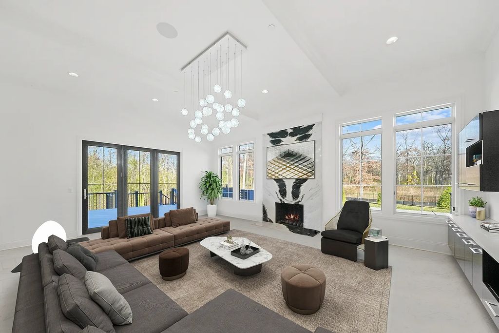 The Estate in Lincolnshire offers a grand scale foyer, ebony oak floors, an open floor plan, soaring ceiling heights, custom luxury finishes throughout now available for sale. This home located at 23477 N Elm Rd, Lincolnshire, Illinois