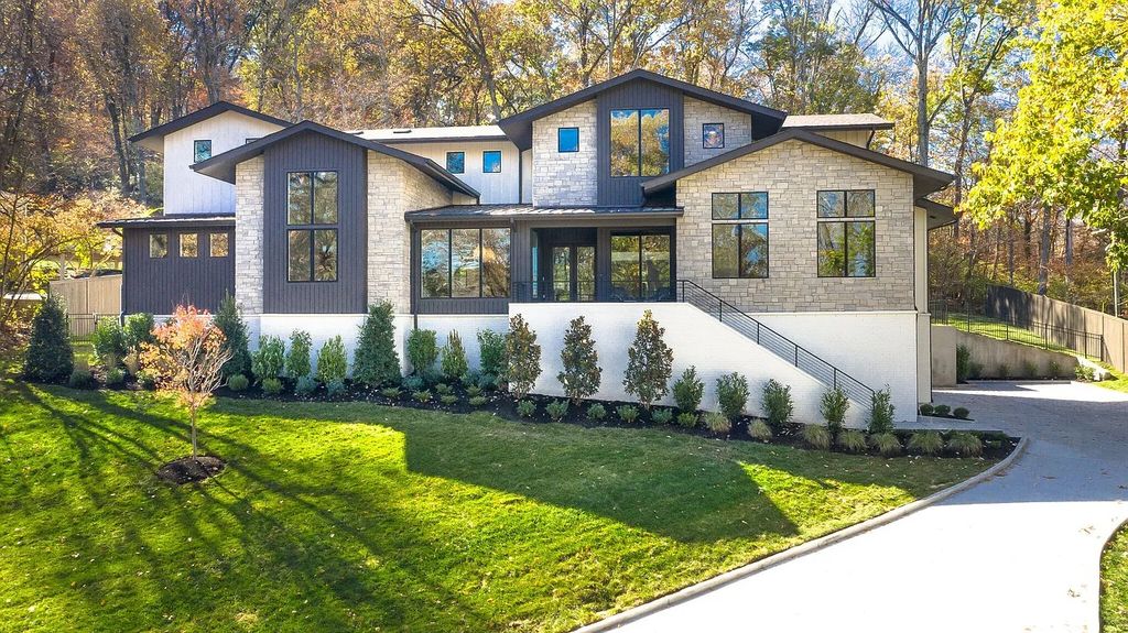 The House in Nashville has a main level master, secondary bedroom, and office along with all the elegant modern touches, now available for sale. This home located at 6523 Currywood Dr, Nashville, Tennessee