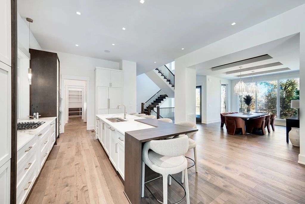 The House in Nashville has a main level master, secondary bedroom, and office along with all the elegant modern touches, now available for sale. This home located at 6523 Currywood Dr, Nashville, Tennessee