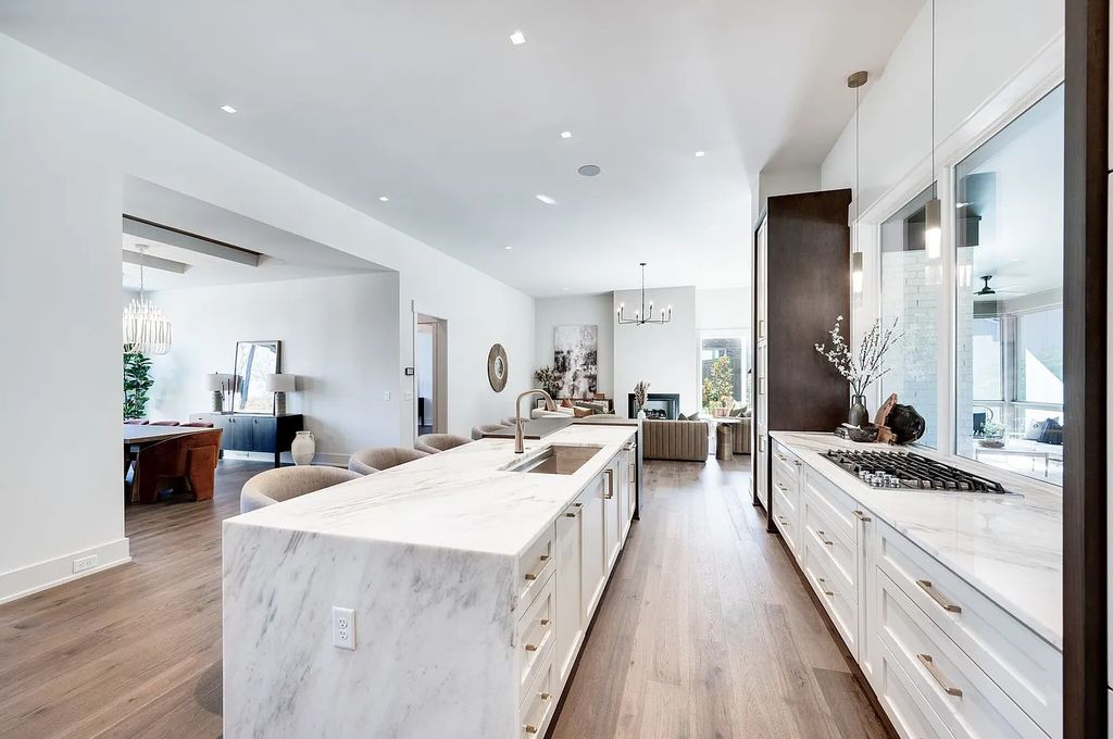 The House in Nashville has a main level master, secondary bedroom, and office along with all the elegant modern touches, now available for sale. This home located at 6523 Currywood Dr, Nashville, Tennessee
