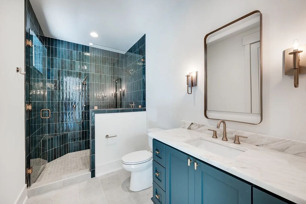 The House in Nashville has a main level master, secondary bedroom, and office along with all the elegant modern touches, now available for sale. This home located at 6523 Currywood Dr, Nashville, Tennessee