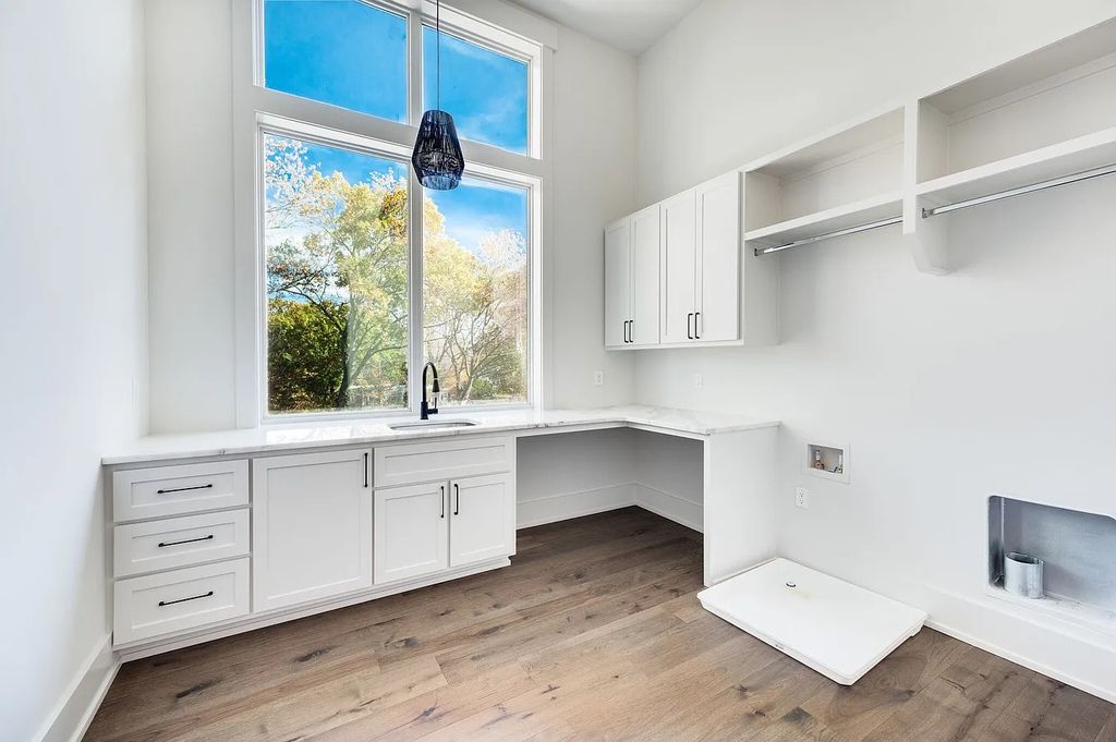 The House in Nashville has a main level master, secondary bedroom, and office along with all the elegant modern touches, now available for sale. This home located at 6523 Currywood Dr, Nashville, Tennessee