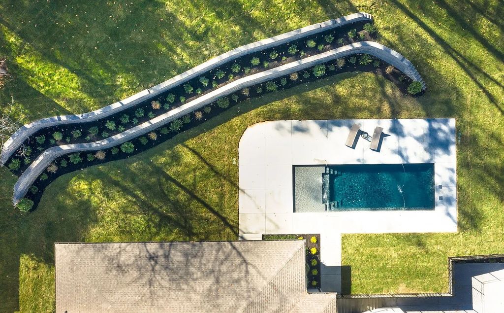 The House in Nashville has a main level master, secondary bedroom, and office along with all the elegant modern touches, now available for sale. This home located at 6523 Currywood Dr, Nashville, Tennessee