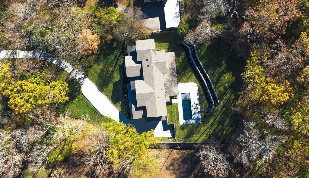 The House in Nashville has a main level master, secondary bedroom, and office along with all the elegant modern touches, now available for sale. This home located at 6523 Currywood Dr, Nashville, Tennessee
