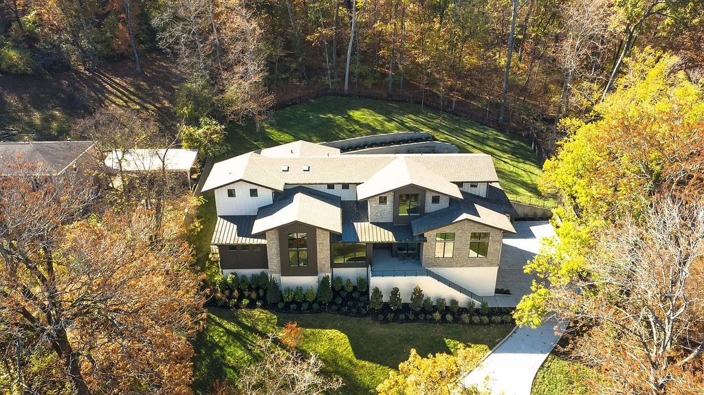 The House in Nashville has a main level master, secondary bedroom, and office along with all the elegant modern touches, now available for sale. This home located at 6523 Currywood Dr, Nashville, Tennessee