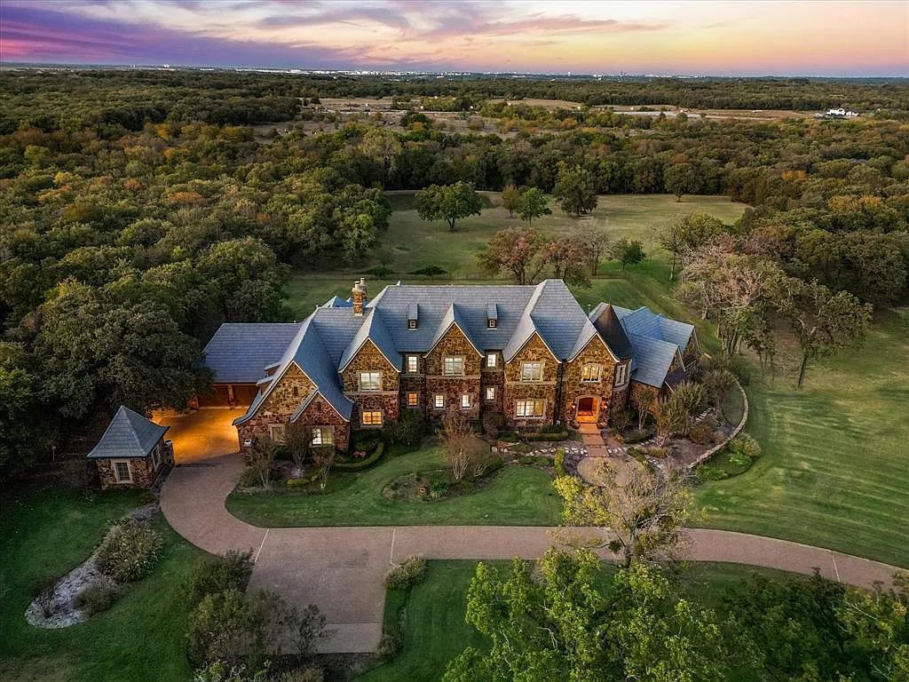 1101 E Hickory Hill Road, Argyle, Texas is a meticulous estate with amazing amenities including 4 fireplaces, climate-controlled wine room accommodates 250-300 bottles, exercise room, guest suite, game room, poker room, media room.