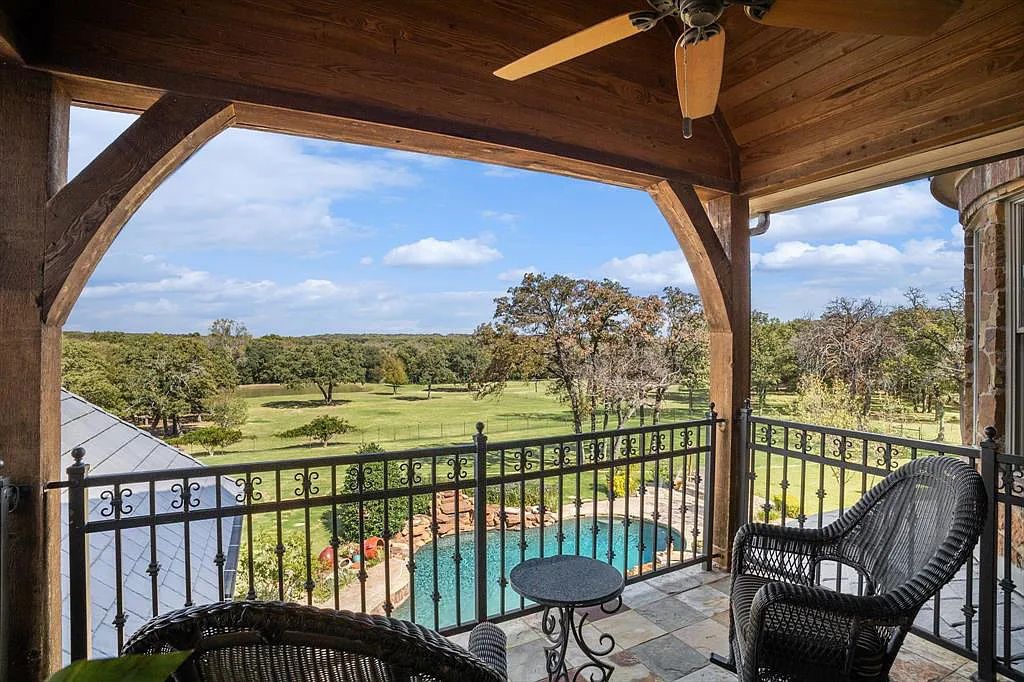 1101 E Hickory Hill Road, Argyle, Texas is a meticulous estate with amazing amenities including 4 fireplaces, climate-controlled wine room accommodates 250-300 bottles, exercise room, guest suite, game room, poker room, media room.
