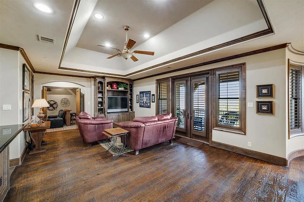 1101 E Hickory Hill Road, Argyle, Texas is a meticulous estate with amazing amenities including 4 fireplaces, climate-controlled wine room accommodates 250-300 bottles, exercise room, guest suite, game room, poker room, media room.