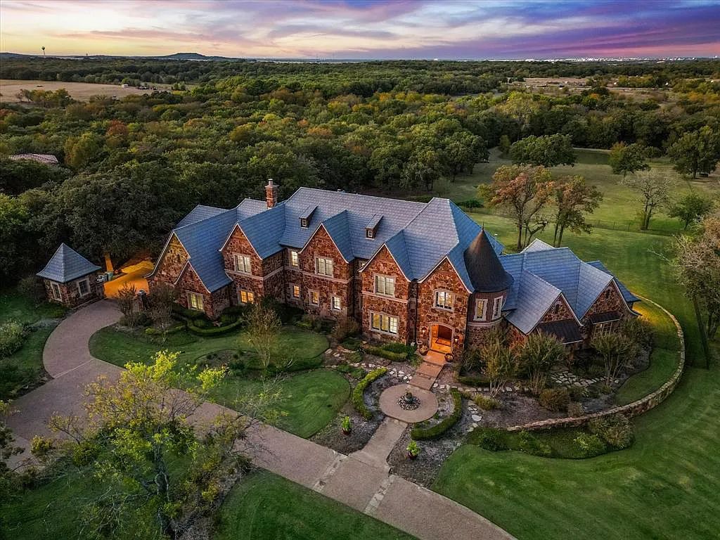 1101 E Hickory Hill Road, Argyle, Texas is a meticulous estate with amazing amenities including 4 fireplaces, climate-controlled wine room accommodates 250-300 bottles, exercise room, guest suite, game room, poker room, media room.