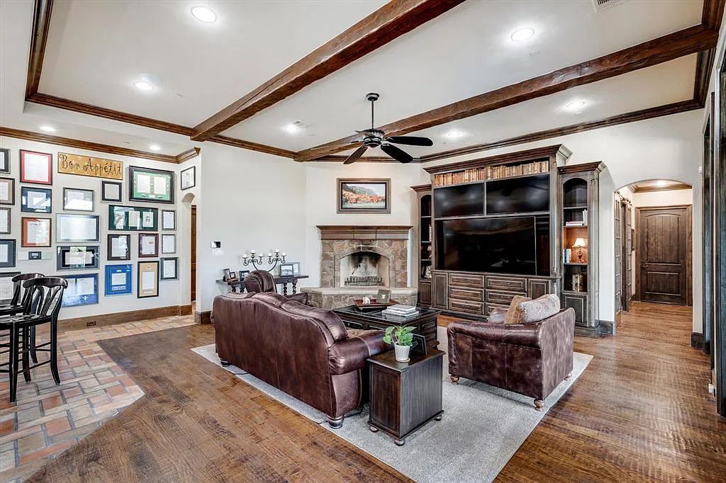 1101 E Hickory Hill Road, Argyle, Texas is a meticulous estate with amazing amenities including 4 fireplaces, climate-controlled wine room accommodates 250-300 bottles, exercise room, guest suite, game room, poker room, media room.