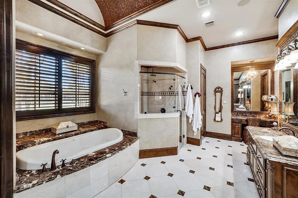 1101 E Hickory Hill Road, Argyle, Texas is a meticulous estate with amazing amenities including 4 fireplaces, climate-controlled wine room accommodates 250-300 bottles, exercise room, guest suite, game room, poker room, media room.