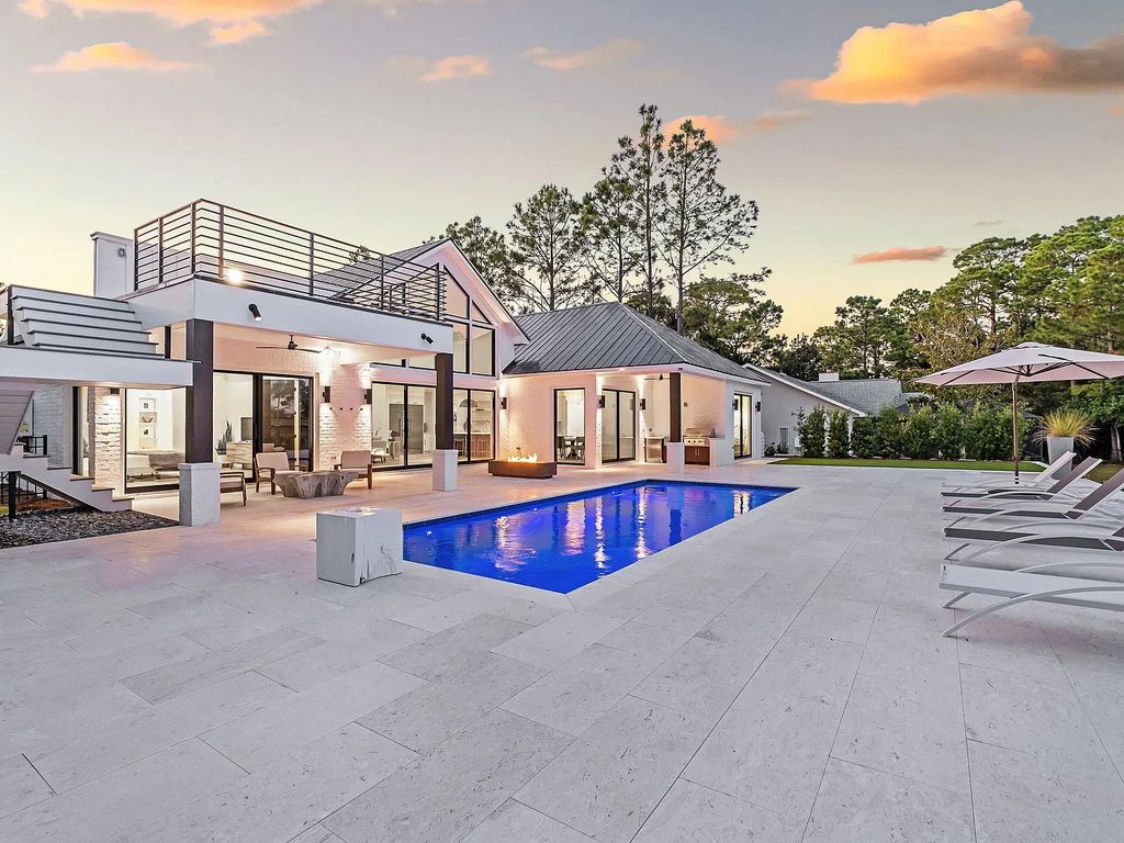 458 Shipwreck Rodd E, Santa Rosa Beach, Florida is a stunning new bayfront home boasts generous indoor and outdoor areas for entertaining, including 2,300 square feet of shell stone on the rear patio.