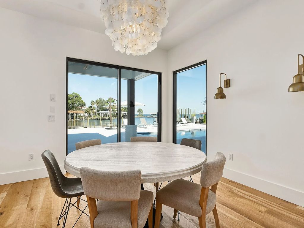 458 Shipwreck Rodd E, Santa Rosa Beach, Florida is a stunning new bayfront home boasts generous indoor and outdoor areas for entertaining, including 2,300 square feet of shell stone on the rear patio.