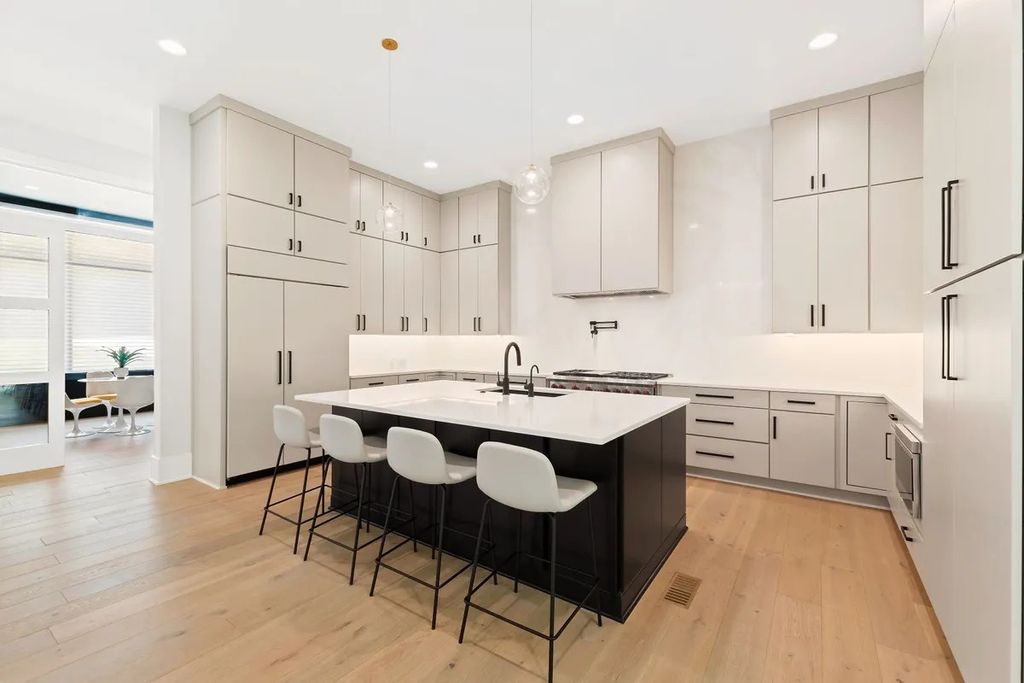 The Estate in Raleigh is a luxurious home featuring open-concept with natural light and expansive windows throughout now available for sale. This home located at 7145 N Ridge Dr, Raleigh, North Carolina; offering 04 bedrooms and 05 bathrooms with 5,702 square feet of living spaces. 