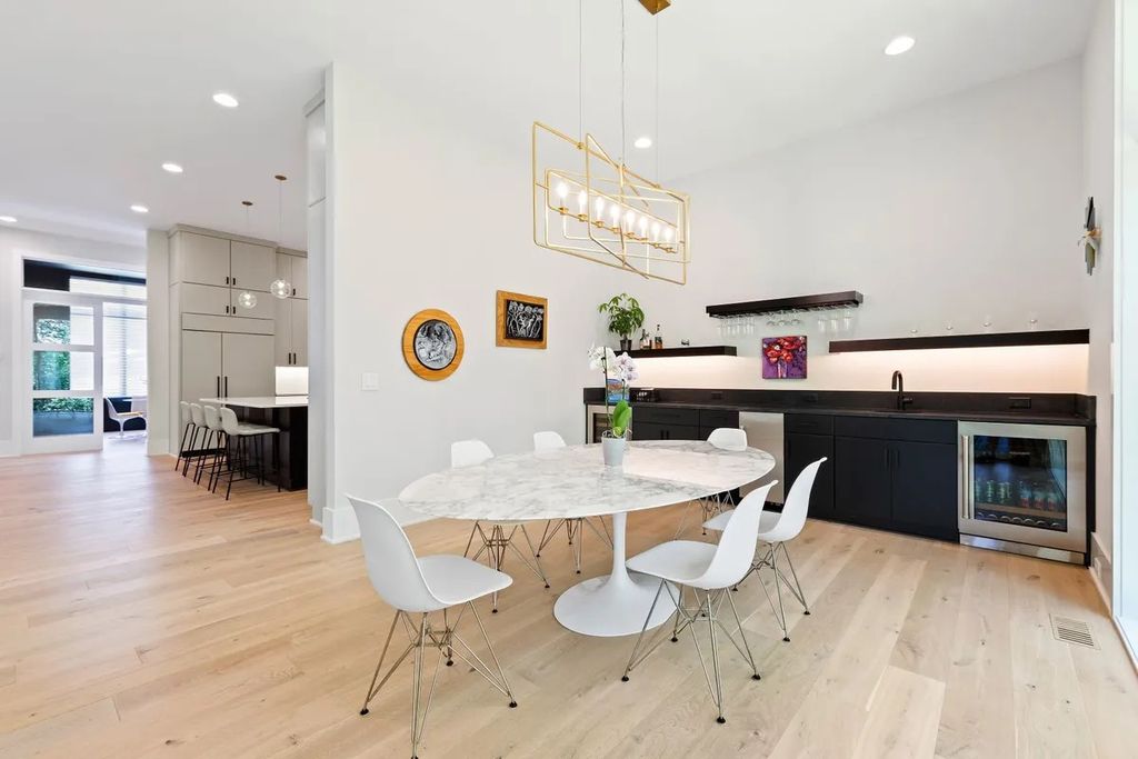 The Estate in Raleigh is a luxurious home featuring open-concept with natural light and expansive windows throughout now available for sale. This home located at 7145 N Ridge Dr, Raleigh, North Carolina; offering 04 bedrooms and 05 bathrooms with 5,702 square feet of living spaces. 