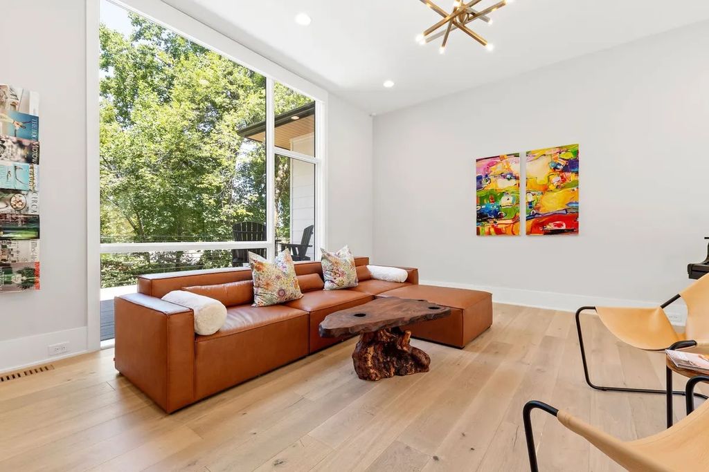 The Estate in Raleigh is a luxurious home featuring open-concept with natural light and expansive windows throughout now available for sale. This home located at 7145 N Ridge Dr, Raleigh, North Carolina; offering 04 bedrooms and 05 bathrooms with 5,702 square feet of living spaces. 