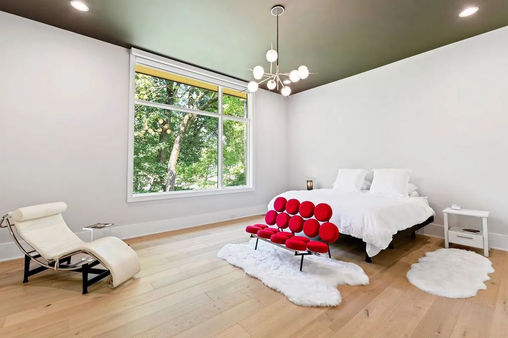 The Estate in Raleigh is a luxurious home featuring open-concept with natural light and expansive windows throughout now available for sale. This home located at 7145 N Ridge Dr, Raleigh, North Carolina; offering 04 bedrooms and 05 bathrooms with 5,702 square feet of living spaces. 