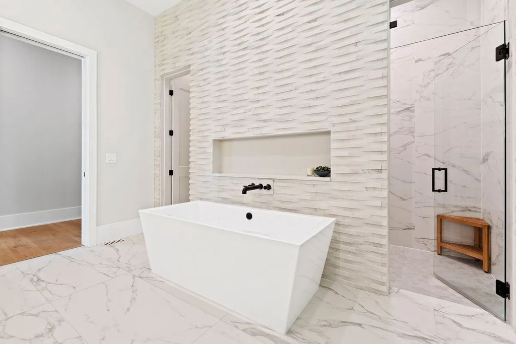 The Estate in Raleigh is a luxurious home featuring open-concept with natural light and expansive windows throughout now available for sale. This home located at 7145 N Ridge Dr, Raleigh, North Carolina; offering 04 bedrooms and 05 bathrooms with 5,702 square feet of living spaces. 
