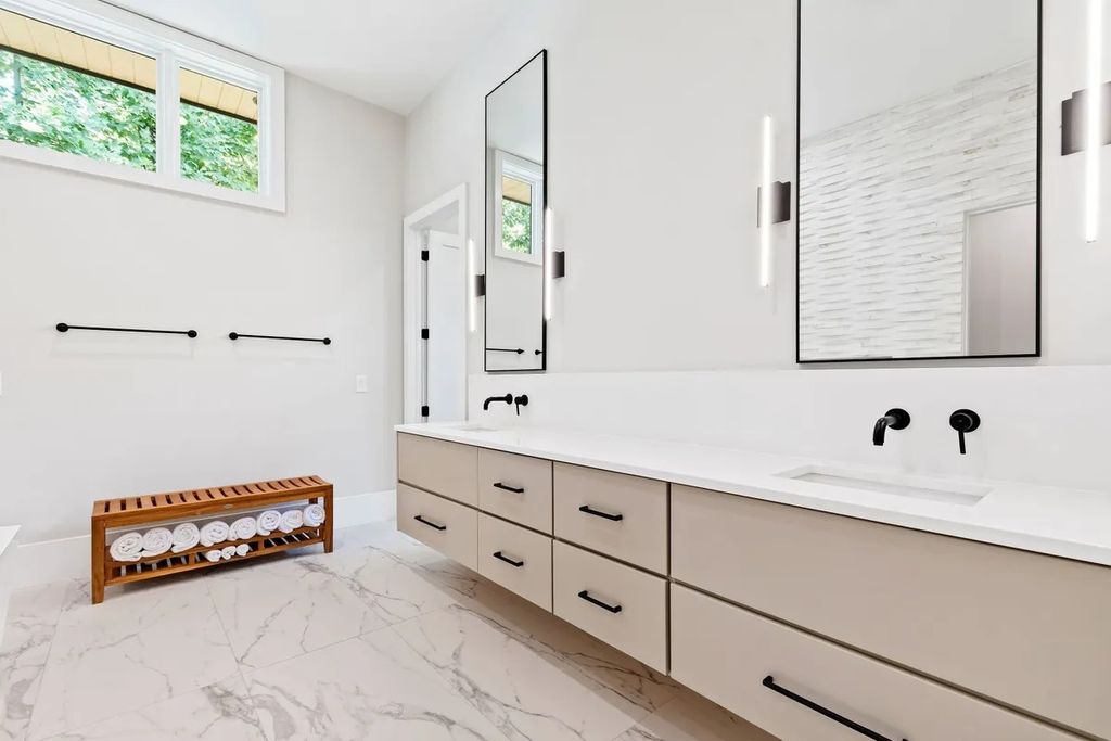 The Estate in Raleigh is a luxurious home featuring open-concept with natural light and expansive windows throughout now available for sale. This home located at 7145 N Ridge Dr, Raleigh, North Carolina; offering 04 bedrooms and 05 bathrooms with 5,702 square feet of living spaces. 