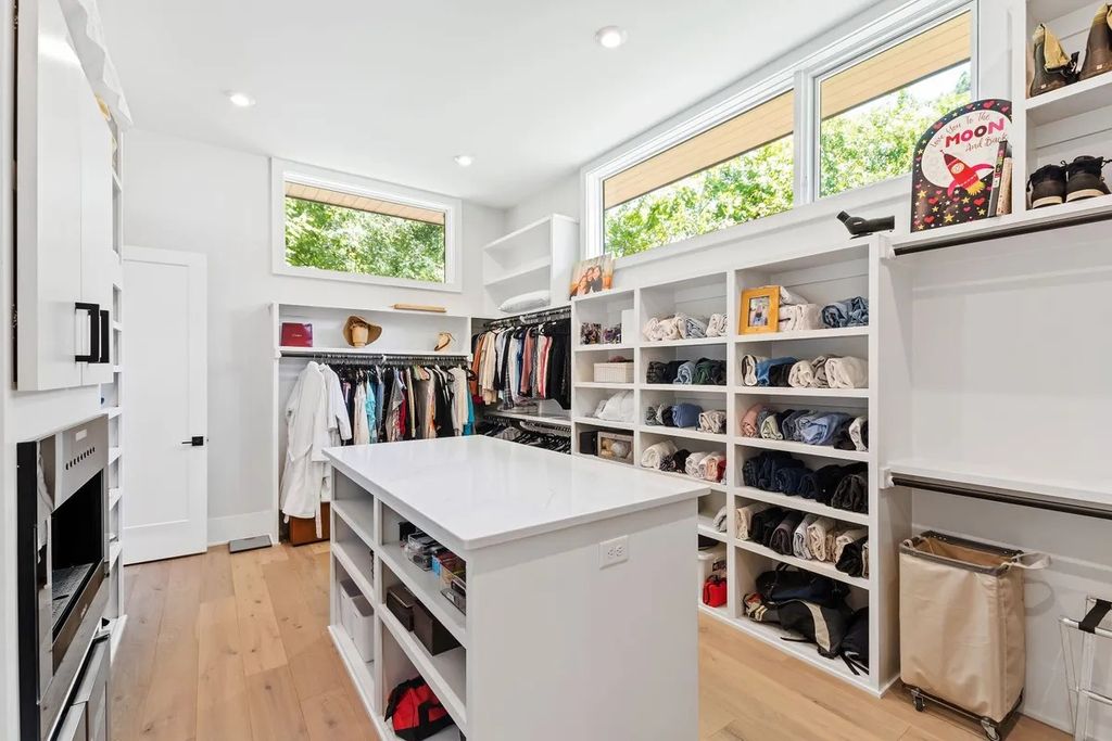 The Estate in Raleigh is a luxurious home featuring open-concept with natural light and expansive windows throughout now available for sale. This home located at 7145 N Ridge Dr, Raleigh, North Carolina; offering 04 bedrooms and 05 bathrooms with 5,702 square feet of living spaces. 